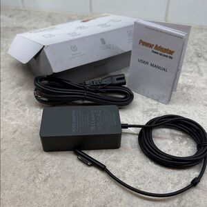 Surface Pro Black Power Adapter with Cable box and manual. New opened box.